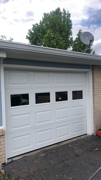 Single garage door with windows
