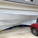 Garage door hit by a car