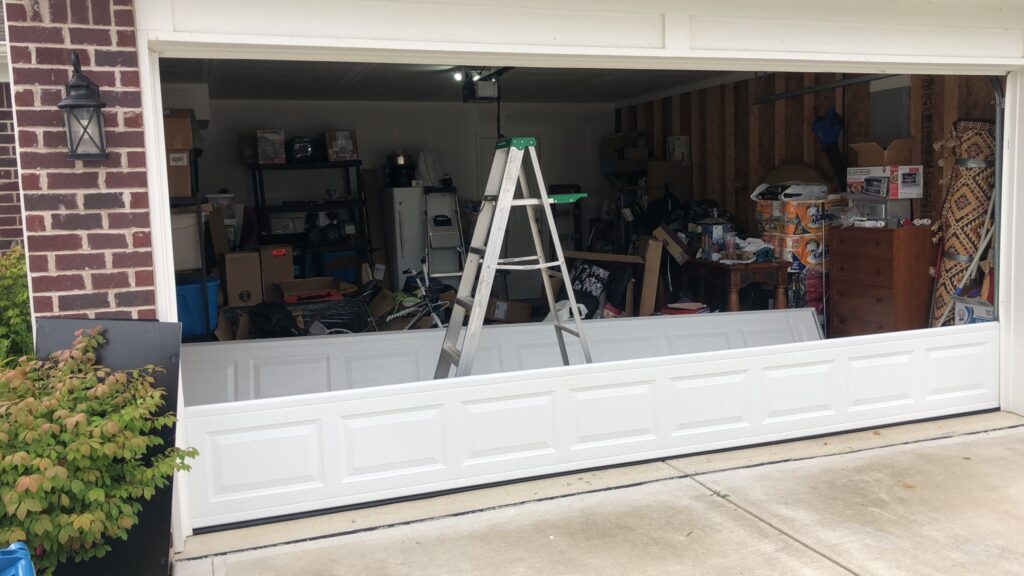 First garage door panel installed
