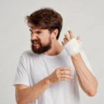 man with bandage on hand