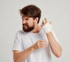 man with bandage on hand