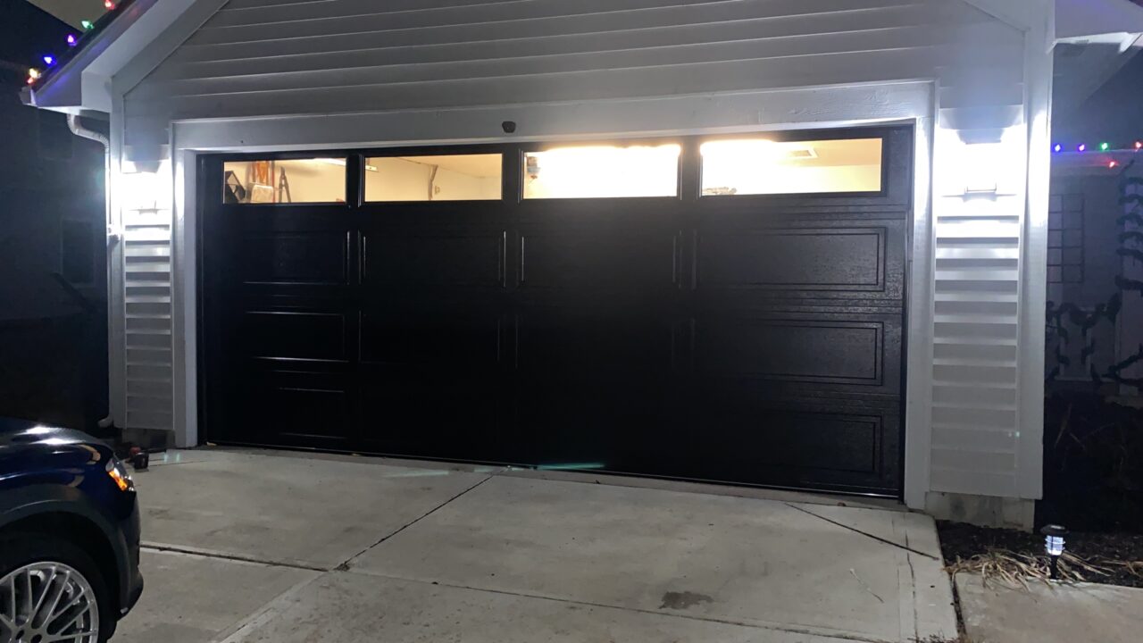 Black insulated door with windows