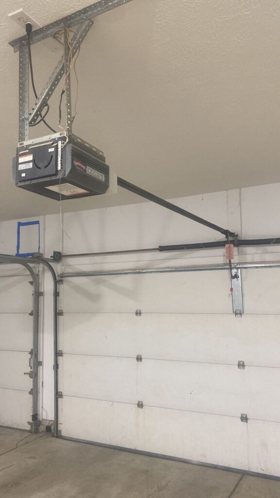 Before: aging Craftsman garage door opener pulled from a Noblesville-area home